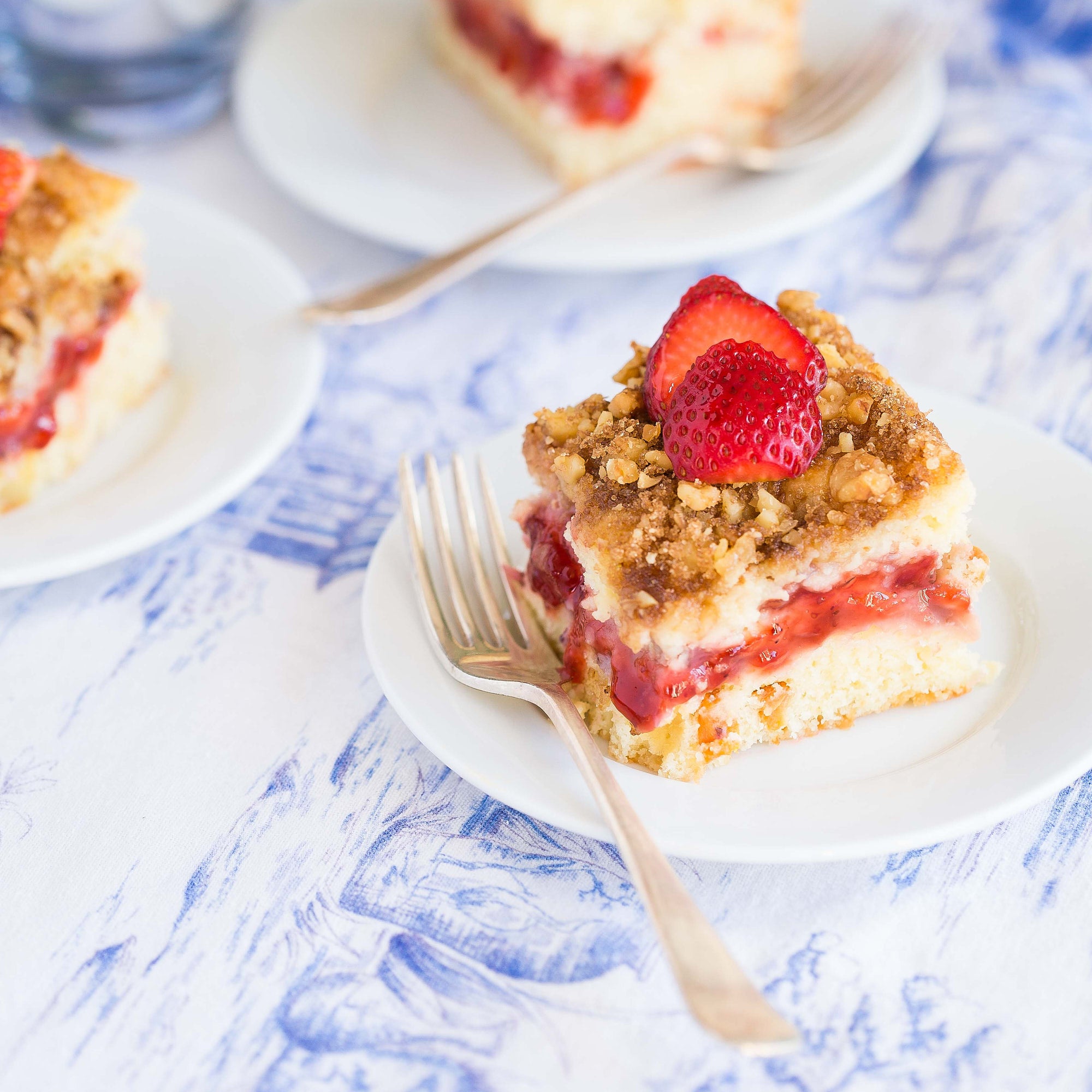 Strawberry Peaches & Crème Cake with Cinnamon Pecan Topping