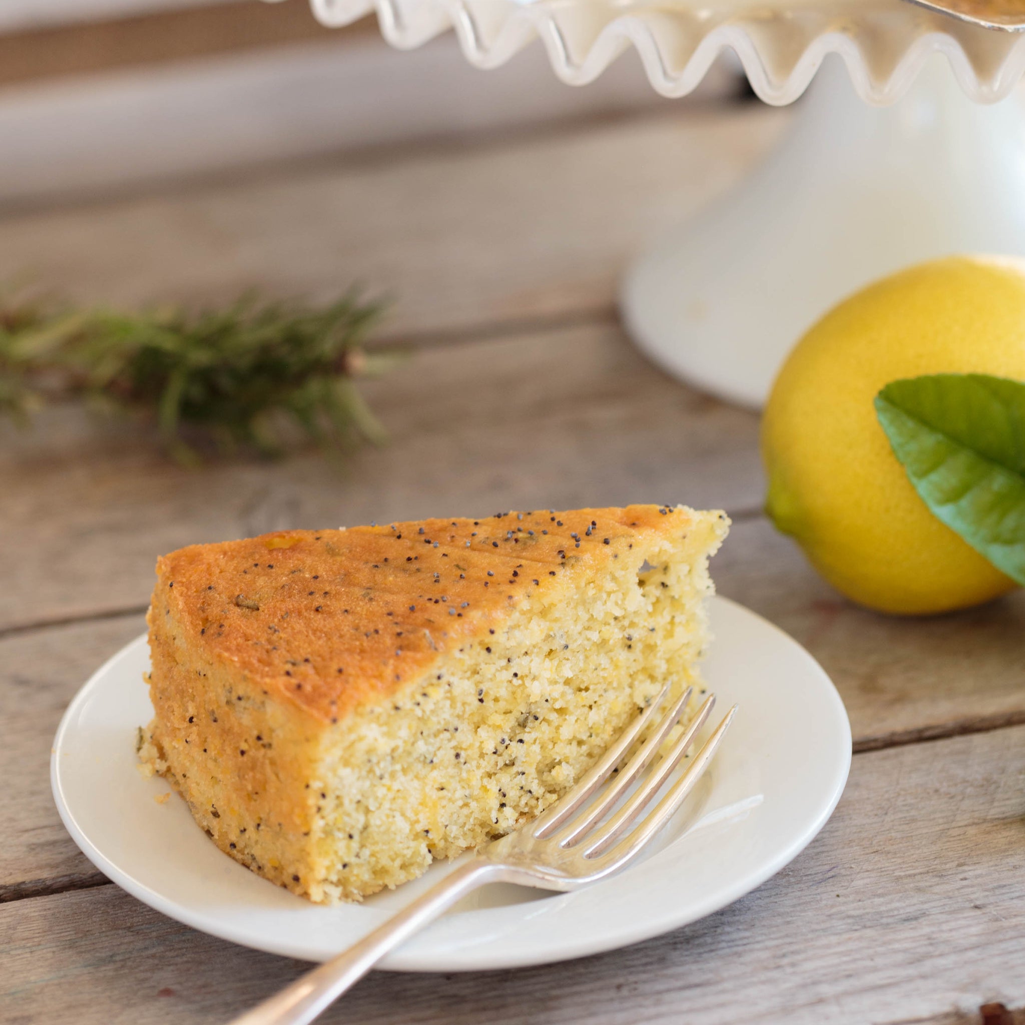 Lemon Cornmeal Poppy Seed Cake with Rosemary-Lemon Syrup